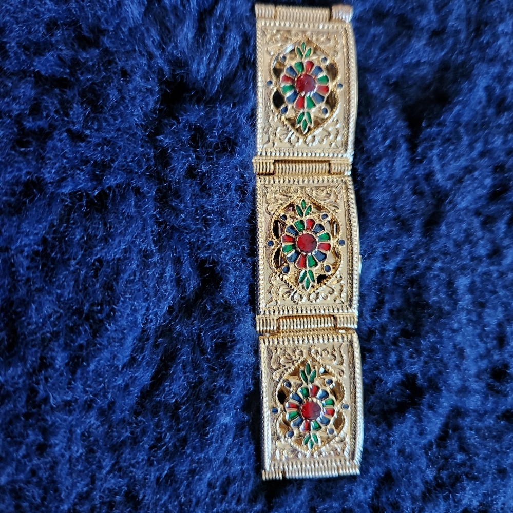 Gold, red, green bracelet